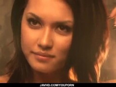 Busty Maria Ozawa likes to pose when playing with toys Thumb
