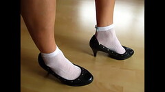 white fishnet socks and black pumps, shoeplay by Isabelle-Sandrine Thumb