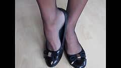 black leather ballet flats, nylons and tattoos, shoeplay by Isabelle-Sandrine Thumb