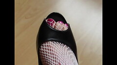 Isabelle-Sandrines shows her peeptoes, wearing fishnet stockings Thumb