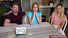 A redhead and a blonde lose a strip game and fuck the male winner Thumb