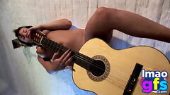 Hot Paul showing her medium tits and pussy with guitar Thumb